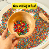 Wooden sensory sieve toy for kids to enhance sorting and fine motor skills.